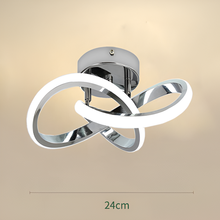 Luminaire moderne LED Ø24 cm, éclairage abstrait et dimmable pour maison.