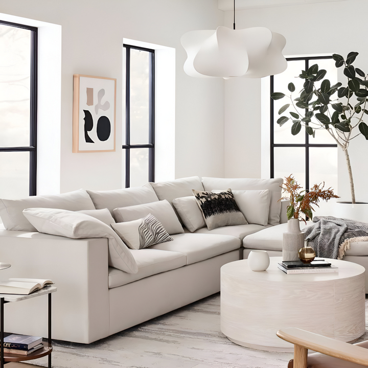 Plafonnier moderne style cocon, éclairage apaisant pour ambiance zen salon.