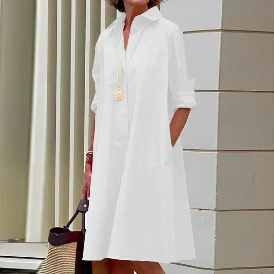 Robe chemise femme noire, style chic et décontracté, offrant confort et élégance pour toutes les saisons.