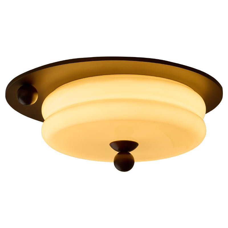 Luminaire plafonnier LED en verre, style épuré, idéal pour les espaces bas, lumière douce.