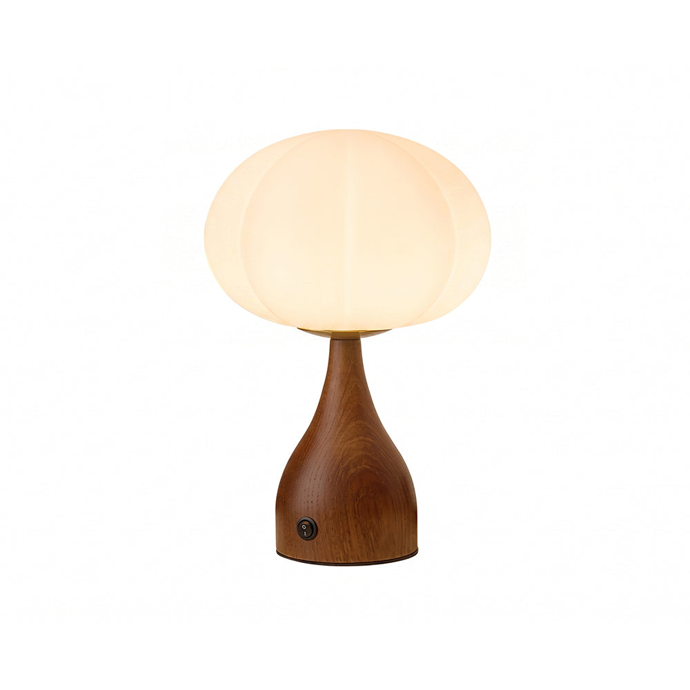 Lampe de table riffée en verre, design moderne, base noyer, éclairage doux pour salon.