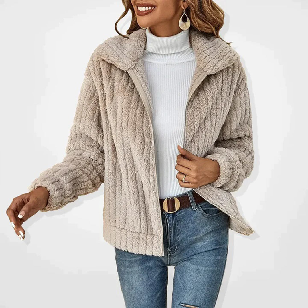 Gilet long femme élégant, coupe fluide et décontractée, idéal pour les tenues d'automne et d'hiver.