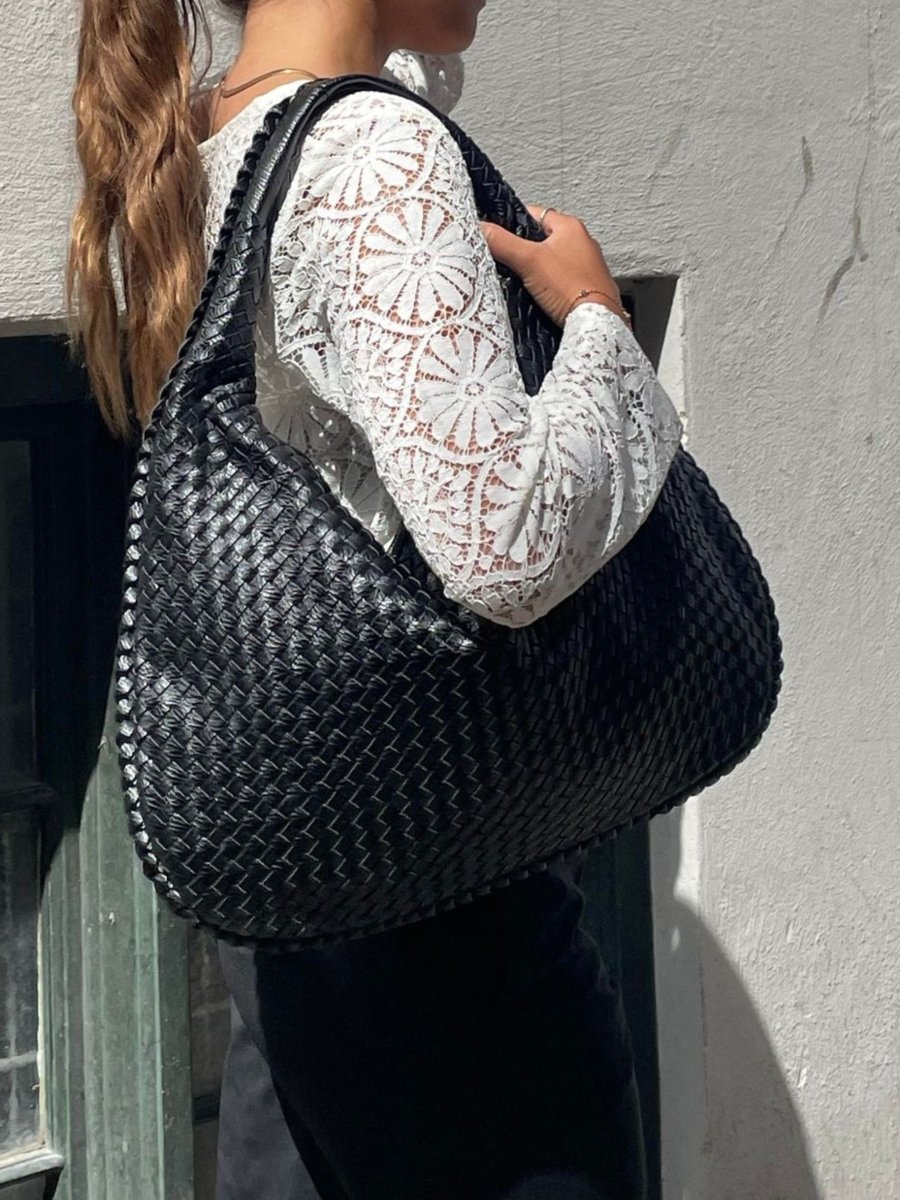 Sac à main TASKTOTE fermé et sécurisé, un compagnon chic et fiable pour l'organisation quotidienne des femmes.