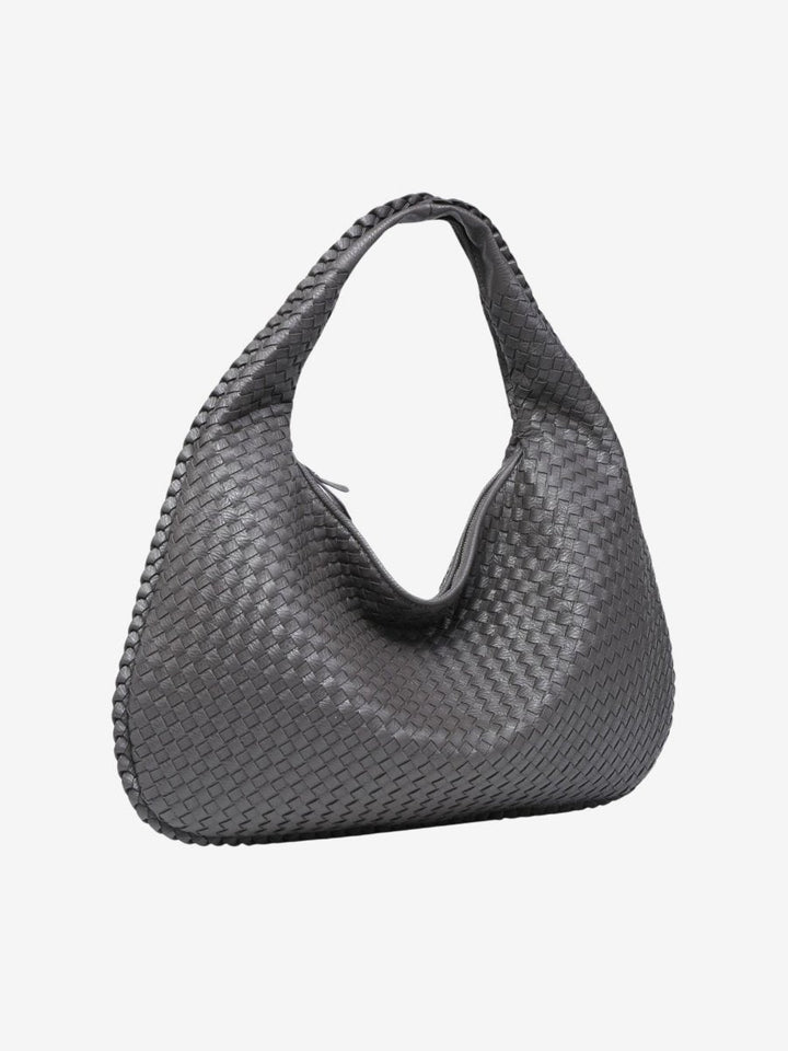 Anses solides du sac à main TASKTOTE, confortables pour porter ce grand sac cabas élégant et fonctionnel.