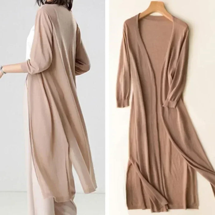Gilet long léger pour femme, style chic et fluide, parfait pour la superposition estivale.