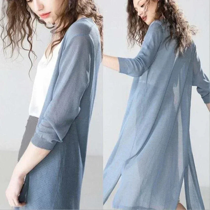 Gilet femme élégant et léger, coupe longue tendance, idéal pour ajouter une touche finale à votre ensemble.