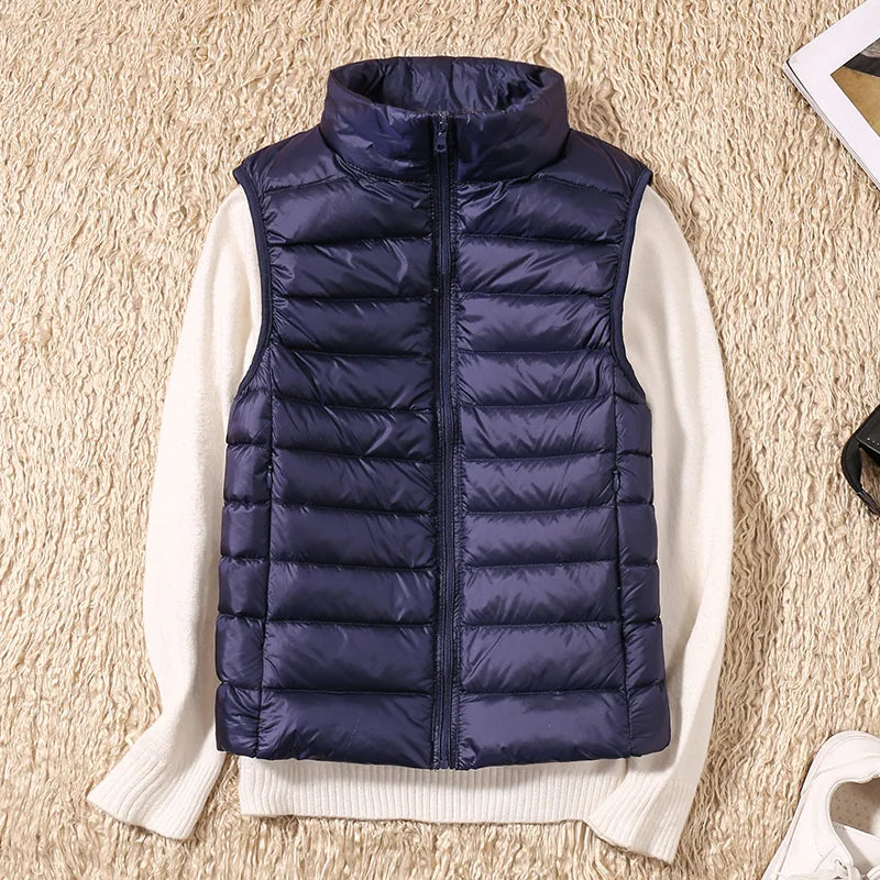Doudoune sans manches femme élégante, idéale pour la mi-saison, chaude et confortable, essentiel mode.