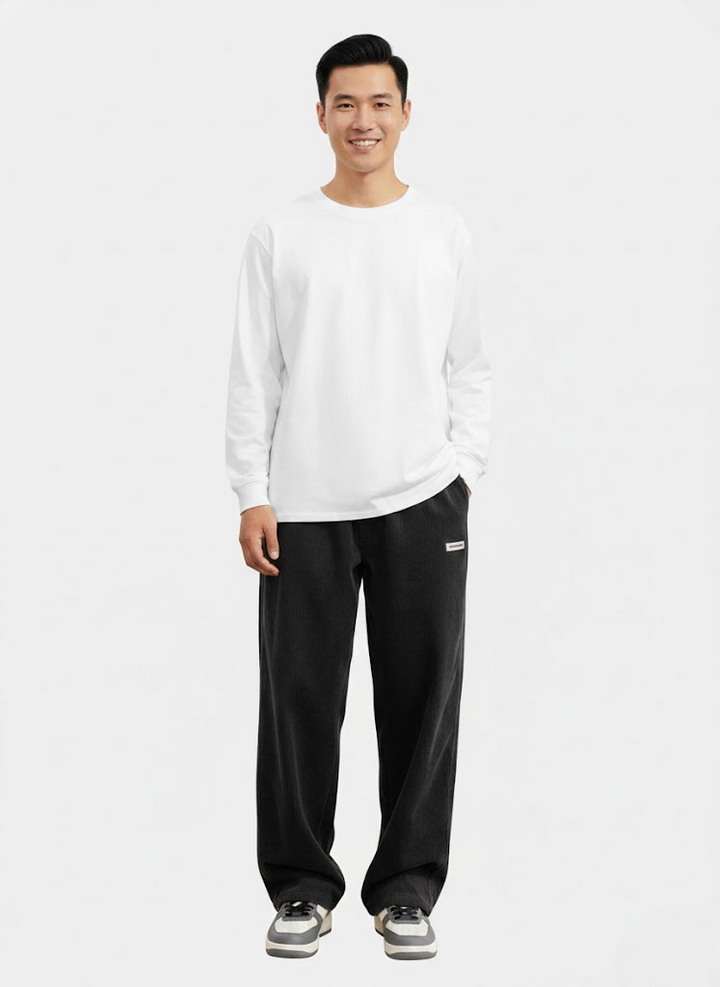 Pantalon homme velours côtelé confortable, coupe décontractée ample. Idéal pour un look streetwear quotidien.