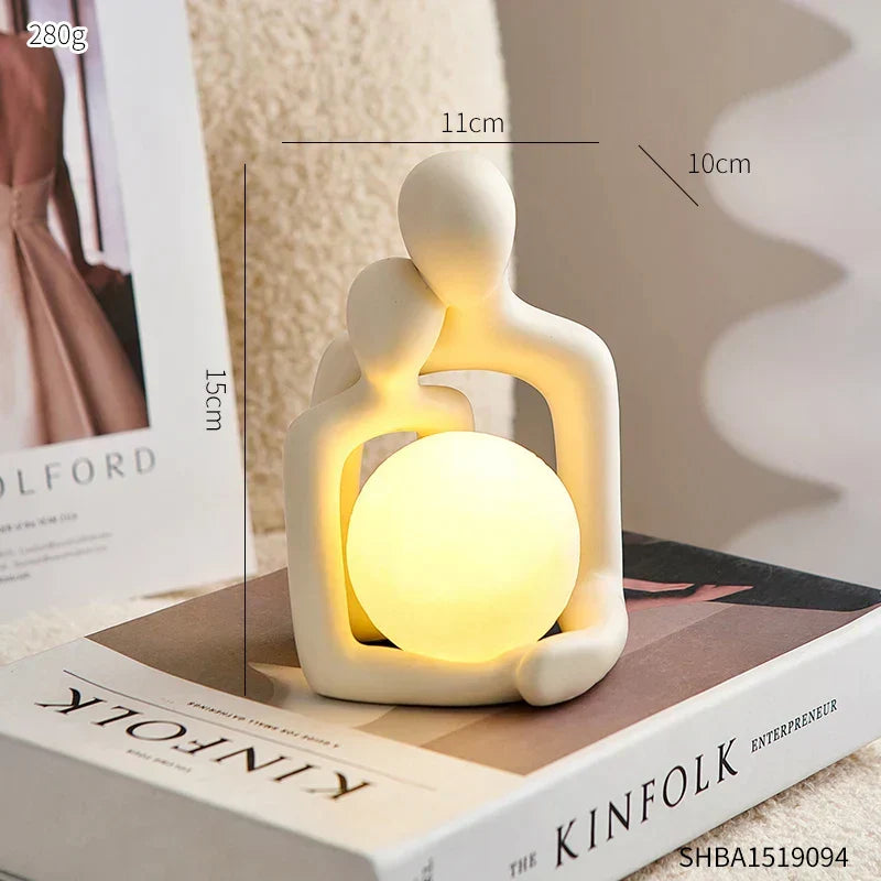 Lampe de table design LunaGlow en céramique, touche moderne pour salon ou chambre, lumière douce.