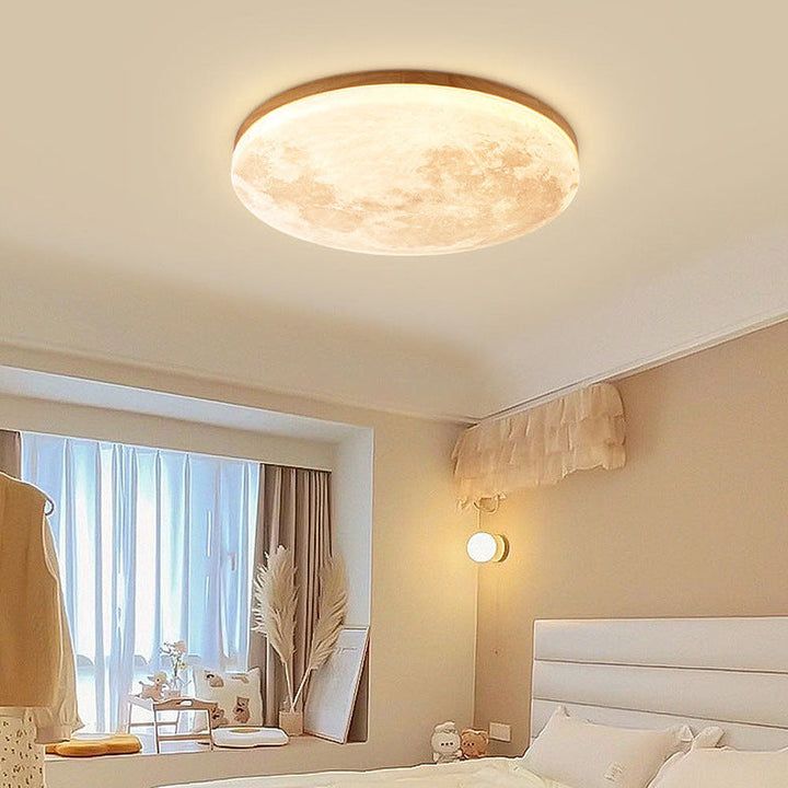 Lampe de plafond LED lunaire 3D moderne pour chambre, éclairage doux et élégant.