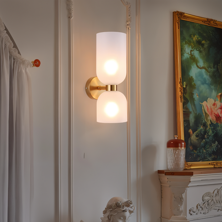 Applique murale design scandinave LED CapsuleLume, lumière up & down élégante.