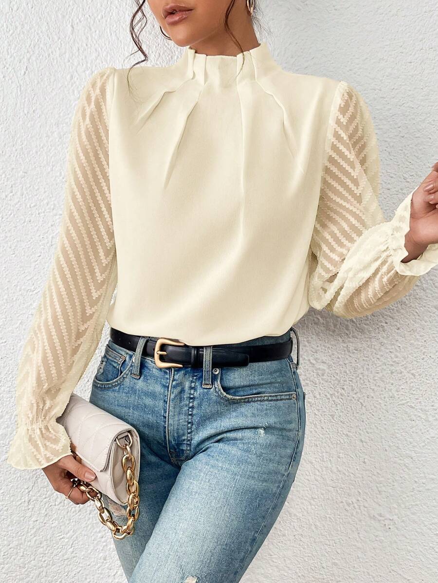 Blouse mode femme Sophie, manches longues et motif tendance. Confortable et chic pour un style décontracté ou pro.