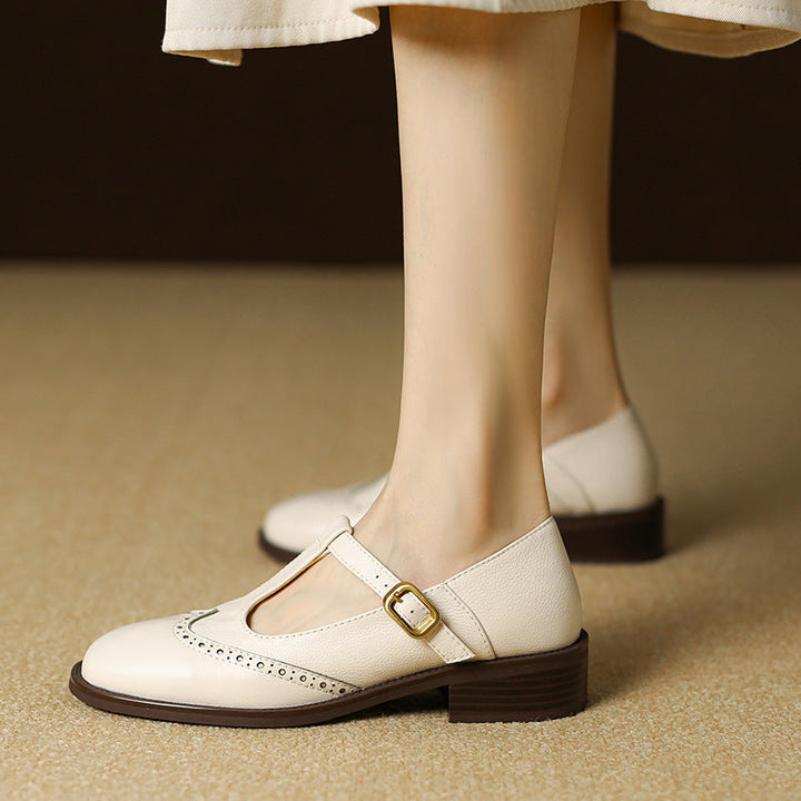 Chaussures Mary Jane femme noires avec talon bloc, style vintage élégant et confort orthopédique.