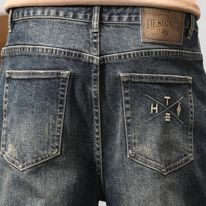 Pantalon homme confort optimal, style décontracté urbain bleu, idéal pour un look moderne et intemporel.