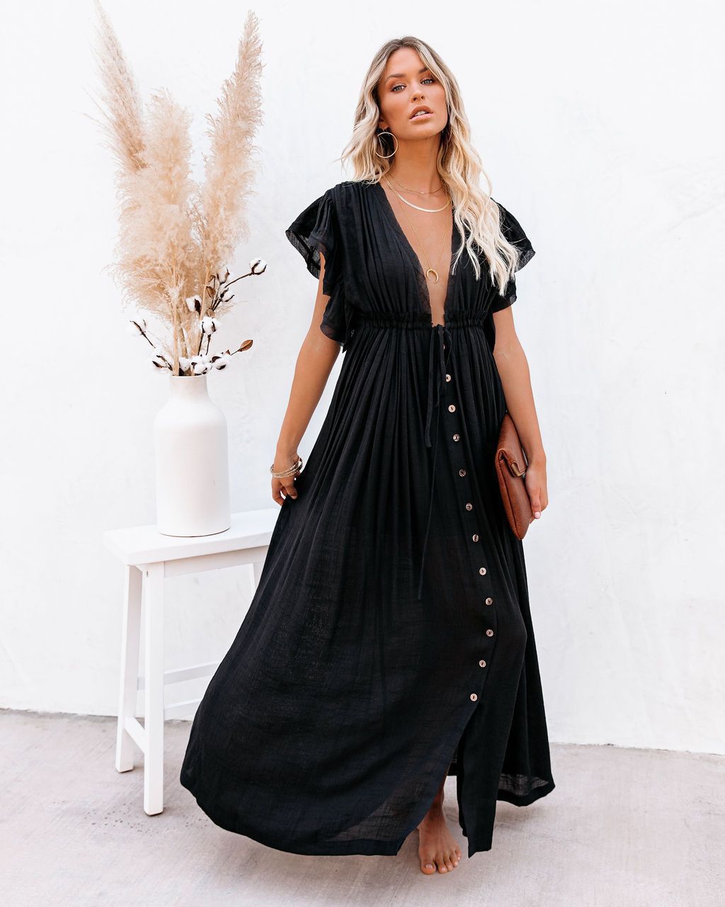 Robe maxi fluide femme, parfaite pour la plage ou une sortie décontractée estivale. Style élégant et léger.
