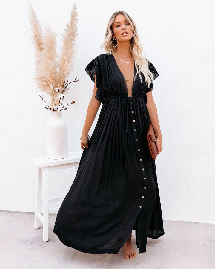 Robe maxi fluide femme, parfaite pour la plage ou une sortie décontractée estivale. Style élégant et léger.