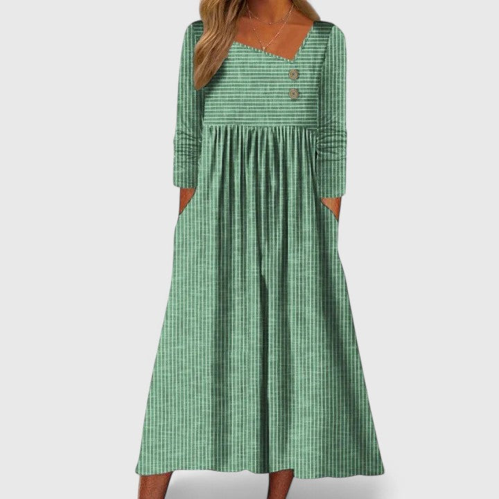 Robe midi asymétrique polyvalente femme, idéale pour bureau ou soirée, alliant style et confort.