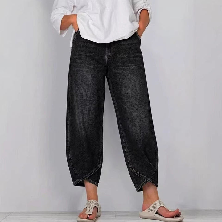 Pantalon femme jean taille haute ample en denim, idéal pour un look chic décontracté et un confort toute la journée.