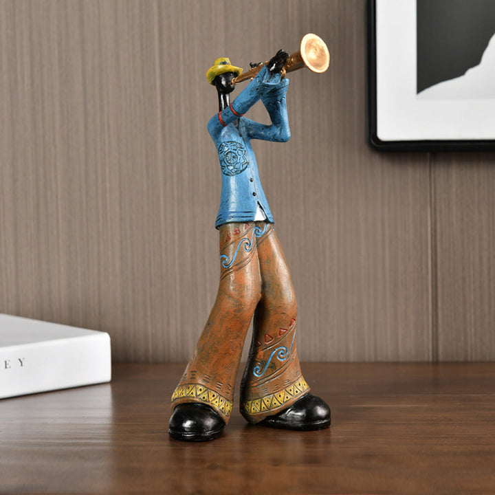 Pièce de collection : figurine de musicien jazz en résine, sculptée à la main pour un intérieur unique.