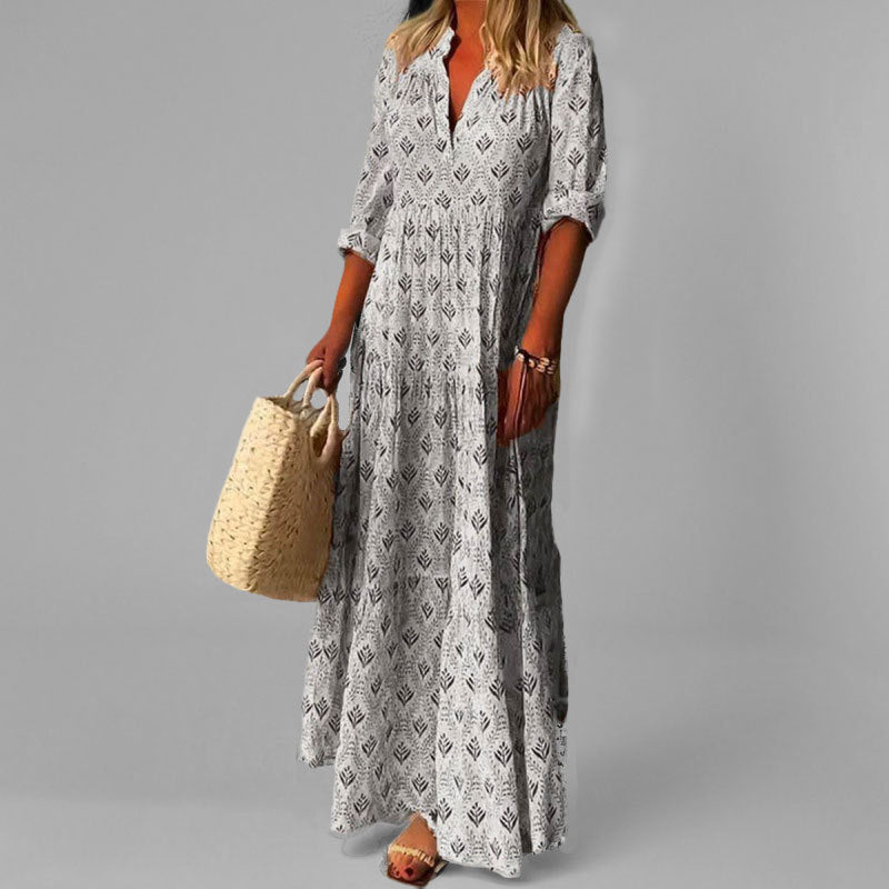 Robe fluide maxi pour femme, style bohème chic, col V et manches 3/4. Idéale pour le printemps-été.