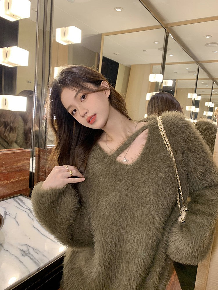 Pull hiver femme douillet, avec un col asymétrique distinctif, alliant chaleur, confort et élégance.