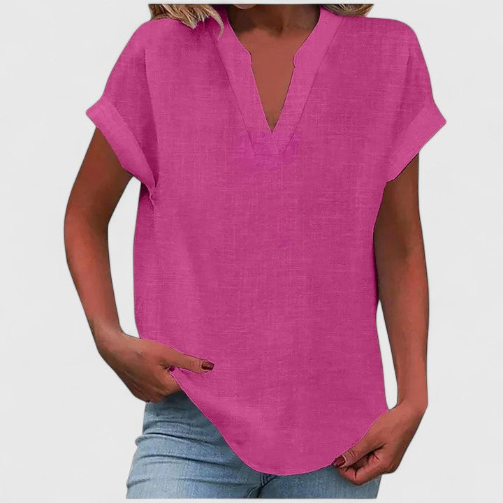 Blouse femme col V confortable et élégante, parfaite pour un look casual d'été.