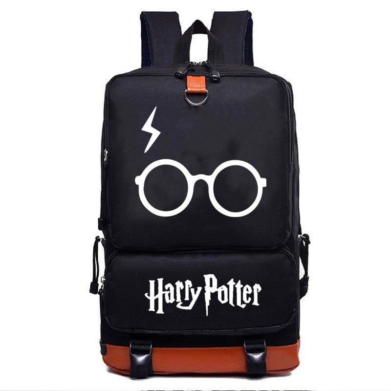 Intérieur du cartable Harry Potter, nombreux rangements pour livres et accessoires scolaires de l'enfant.