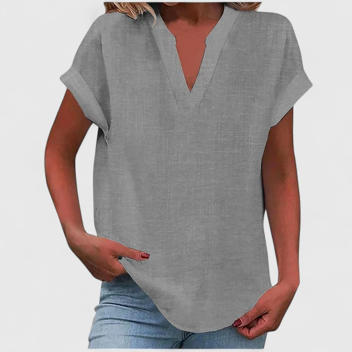 Élégante blouse femme col V, décontractée mais chic, pour un style quotidien printanier.