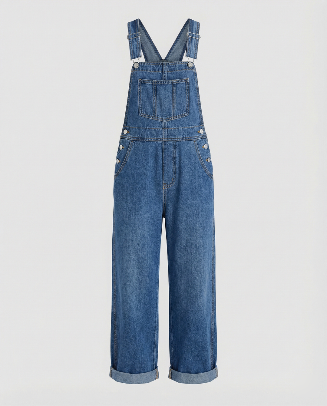 Vêtement femme: salopette en jean oversize, bretelles réglables, poches multiples, look décontracté urbain.