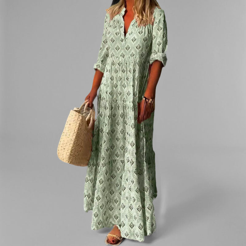 Longue robe d'été bohème fluide, coupe maxi vintage, col V. Parfaite pour un look chic et décontracté.