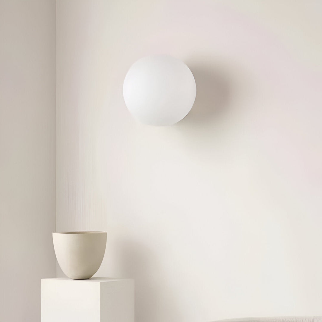 Éclairage mural rond pour salon, crée une atmosphère douce et relaxante.