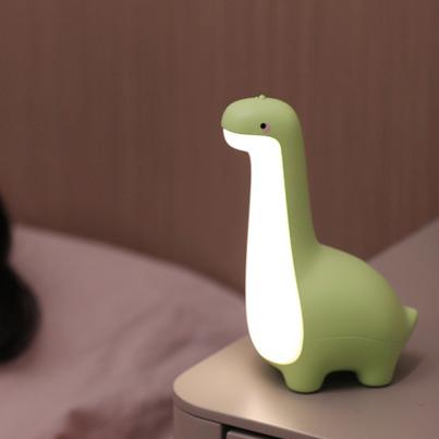 Veilleuse dinosaure en silicone, lampe de nuit LED douce idéale pour la chambre des enfants.