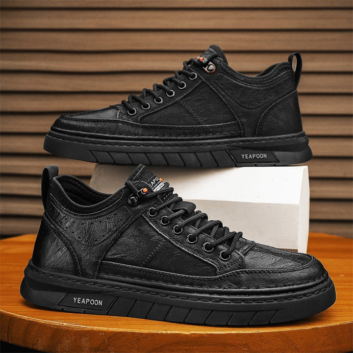 Baskets hommes sportif chic effet cuir, alliant élégance et confort pour un look moderne et urbain.