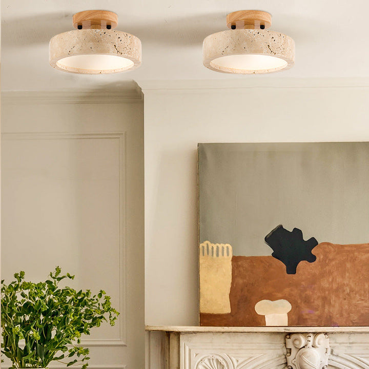 Plafonnier LED rond en travertin. Éclairage intérieur design moderne avec changement de couleur et luminosité.