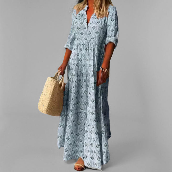 Robe maxi fluide bohème femme, col en V, manches 3/4. Parfaite pour l'été et la mode décontractée chic.