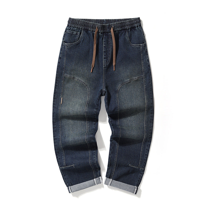 Pantalon large bleu pour homme, parfait pour un style décontracté moderne et versatile, look urbain.