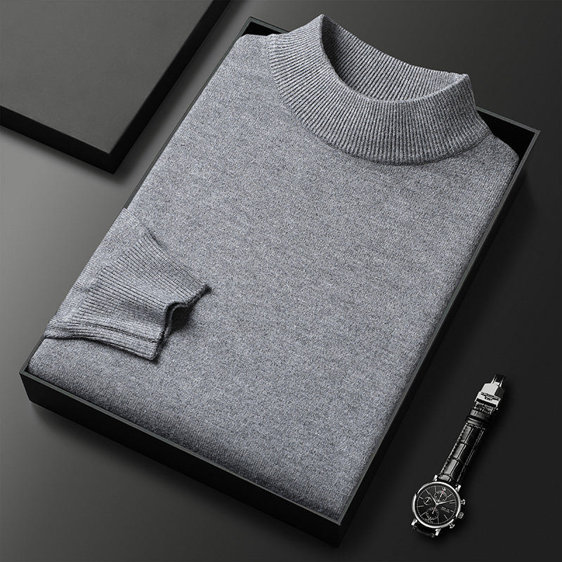 Pull homme élégant col mi-montant pour l'hiver, mode masculine confortable et stylée.
