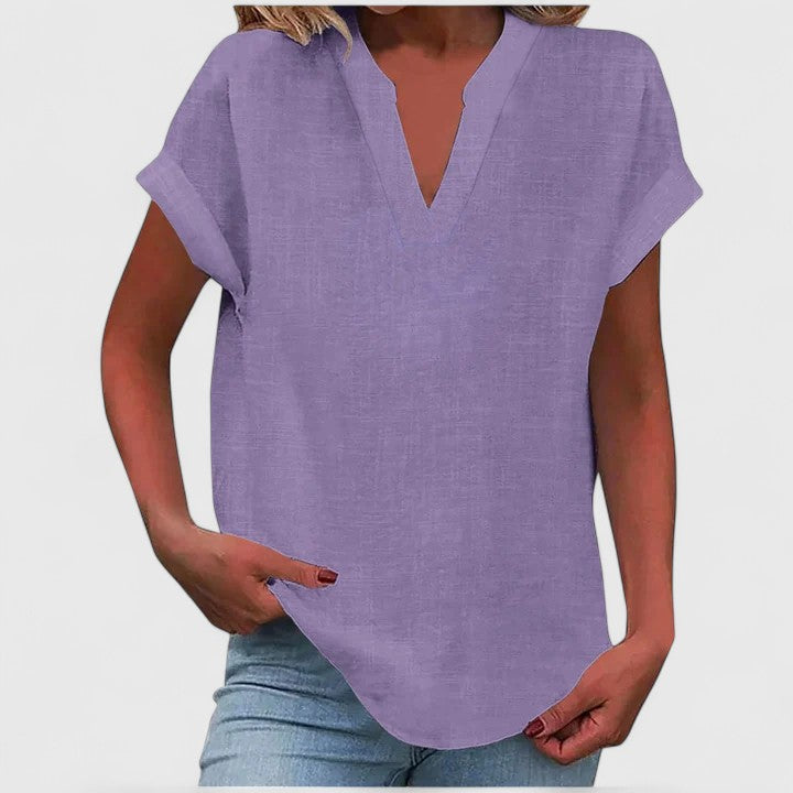 Blouse femme col V casual d'été, un vêtement élégant et frais pour la saison chaude.