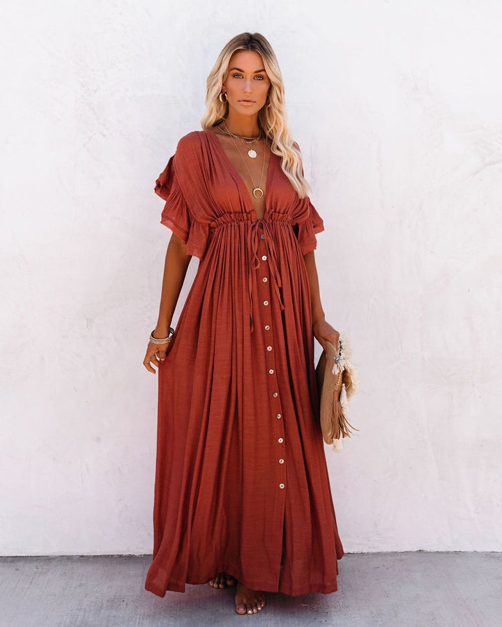 Robe longue femme tendance, indispensable pour la mode estivale. Design fluide et élégant pour toute occasion.