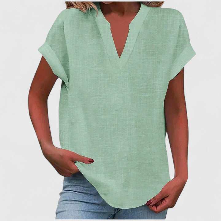Blouse femme chic décontractée à col V, idéale pour le confort et la mode quotidienne.