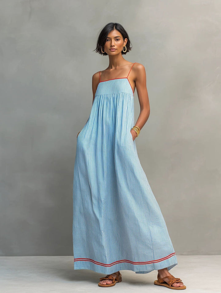 Robe longue fluide femme à rayures, bretelles spaghetti. Style décontracté élégant et confortable pour l'été.