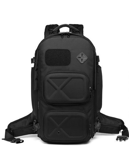 Sac à dos extensible TravelPack avec poches latérales pour bouteilles d'eau ou petits objets.