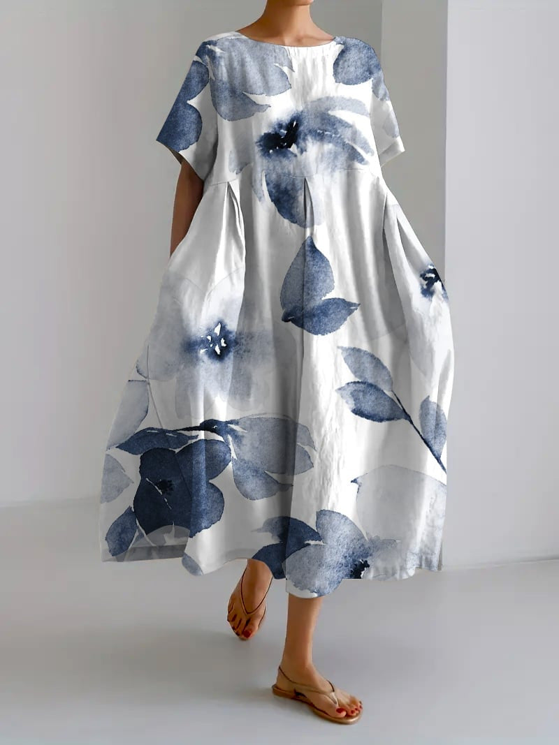 Magnifique robe midi fleurie Sareno pour femme. Style décontracté chic, parfait pour l'été et le printemps.