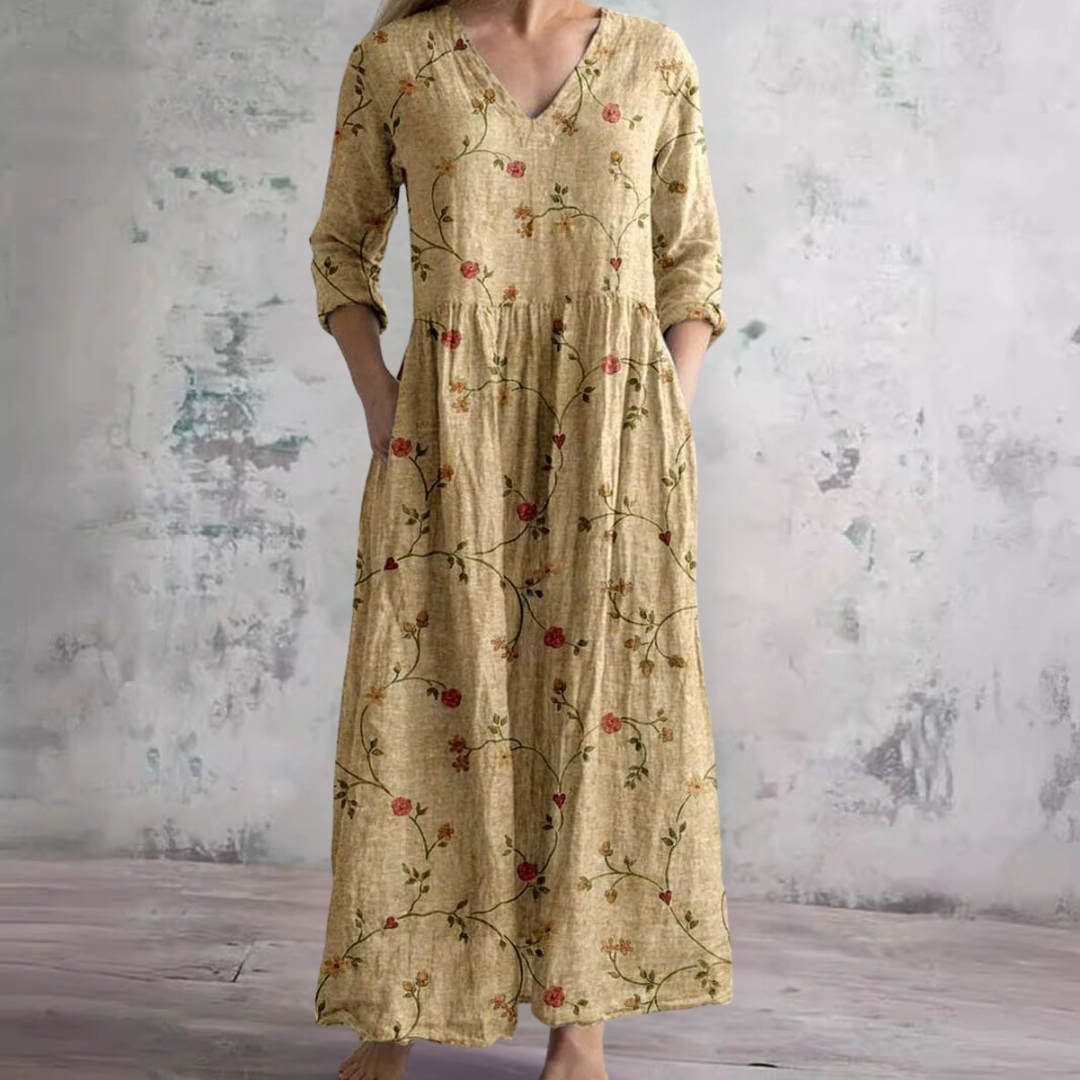 Robe d'été maxi à fleurs, coupe fluide et décontractée. Offre une élégance estivale et un grand confort pour femme.