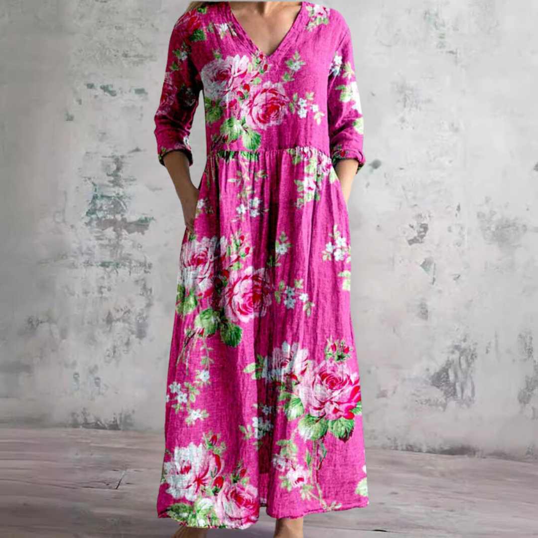 Robe longue fleurie style bohème, avec col V pour femme. Confortable et légère, parfaite comme tenue décontractée.