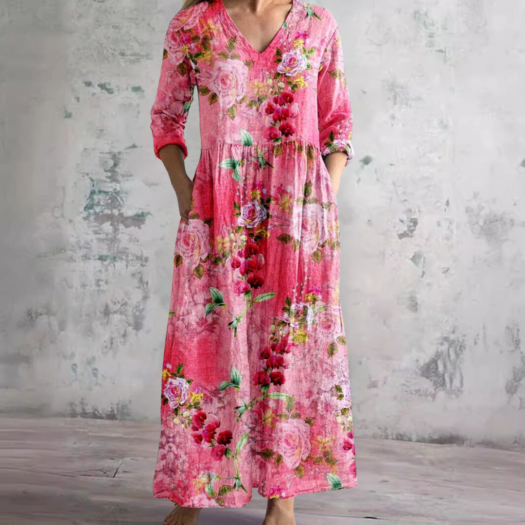 Élégante robe bohème fleurie avec un col V. Robe longue fluide, idéale pour l'été et le confort féminin.