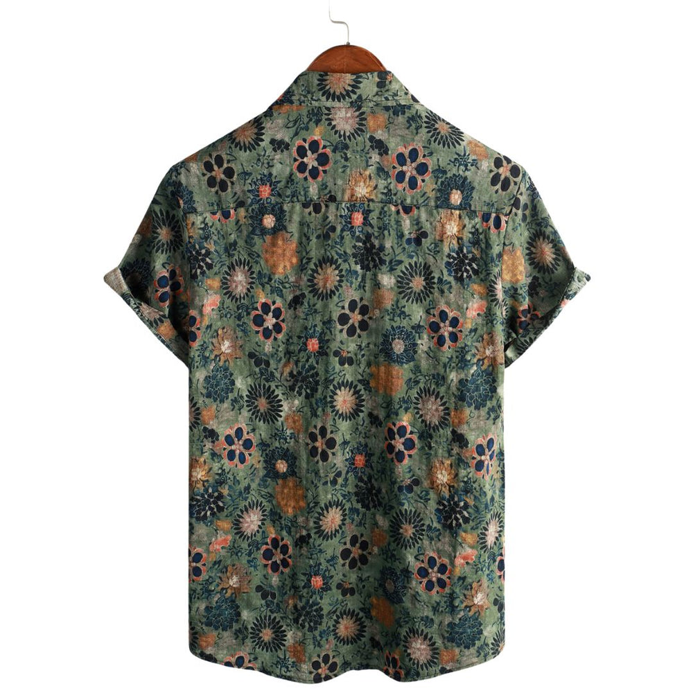 Chemise tropicale homme fluide, boutonnée, motif floral coloré, idéale pour vacances d'été.