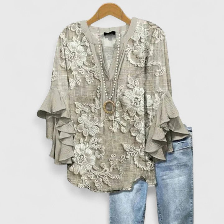 Blouse femme chic avec volants, motif floral et coupe confortable pour le quotidien.