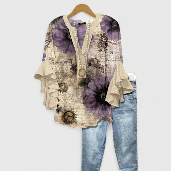 Blouse femme florale taille plus, chic et confortable, idéale printemps-été, avec un motif printanier.