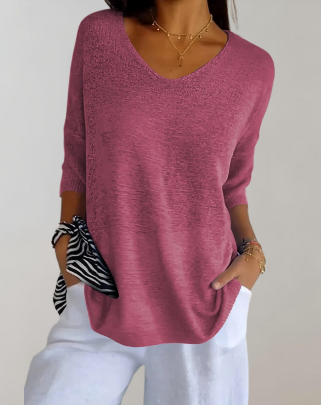 Pull femme décontracté. Haut tricoté Marise à col V, élégant et confortable, idéal pour la mode féminine.